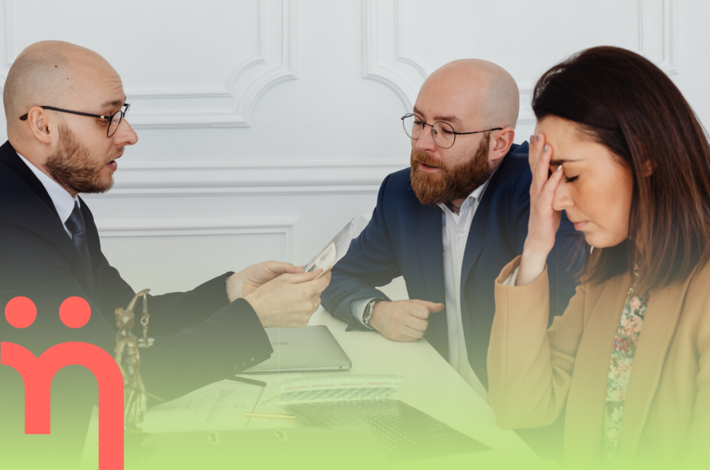 Two people in conversation in a professional setting, representing multiple perspectives in complex situations involving human communication